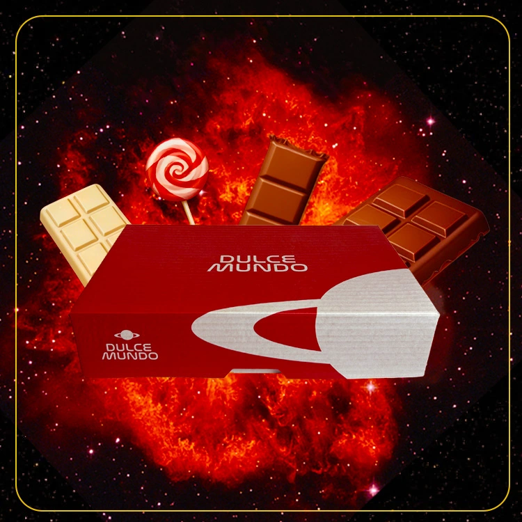 Caja de regalo DulceMundo flotando en el espacio con golosinas y arte para sorprender a personas de todas las edades.